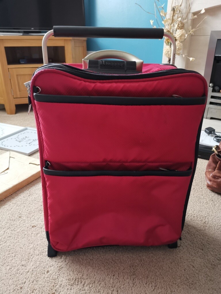 red it suitcase